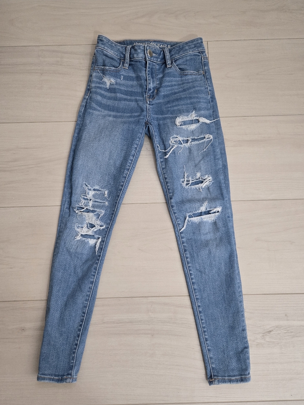 American Eagle Outfitters Medium Blue Distressed Jeggings
